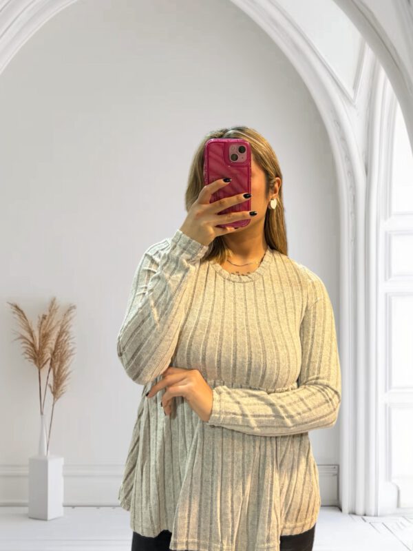 Jersey suave volante